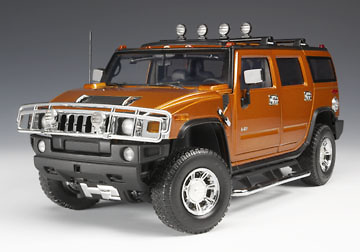 Hummer H2 DCP 1/18 Naranja Metalizado 