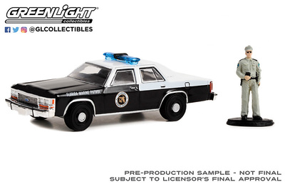 Ford LTD Crown Victoria "Patrulla Maritima de Florida" (1990) con figura de Policia Greenlight 1/64